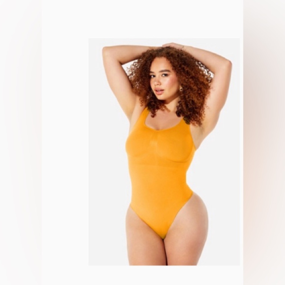Yitty Nearly Naked Shaping Thong Bodysuit in Mimosa Yellow